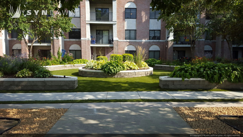 Courtyard of an apartment complex with artificial grass