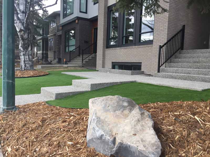 Artificial grass building front installed by SYNLawn