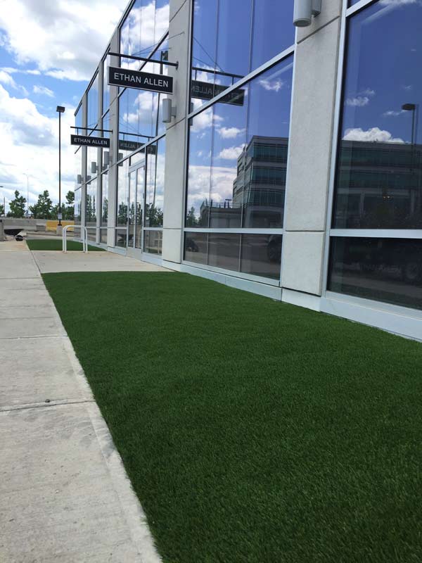 Commercial artificial grass storefront installed by SYNLawn Alabama