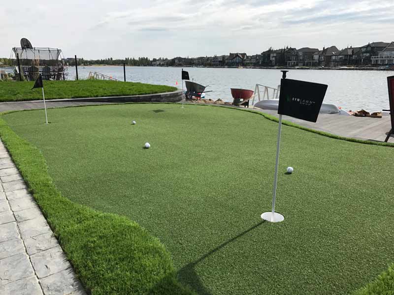 Waterfront artificial grass golf green installed by SYNLawn