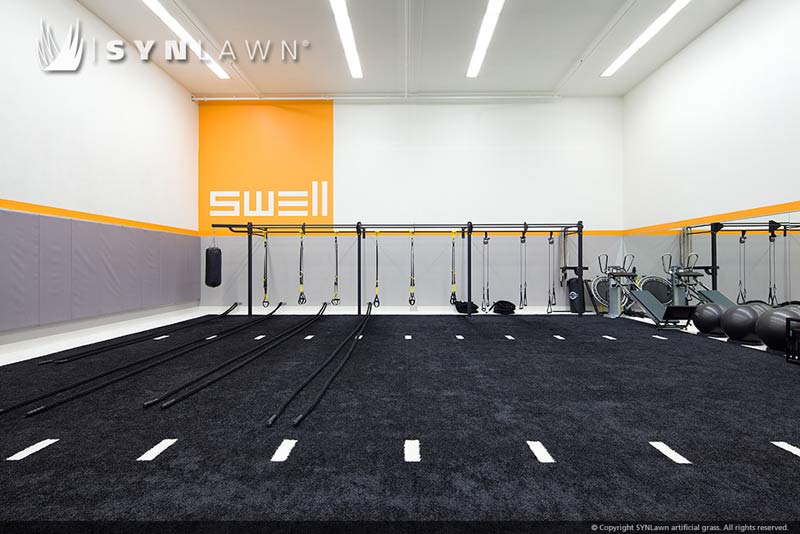 Indoor weight training artificial grass room from SYNLawn