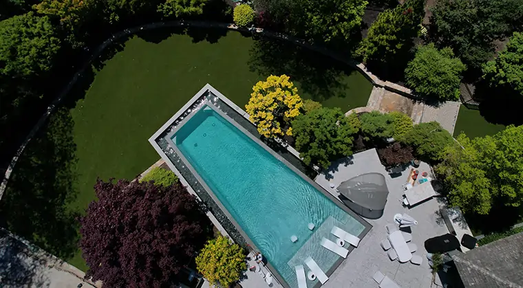 Drone shot of artificial grass pool area