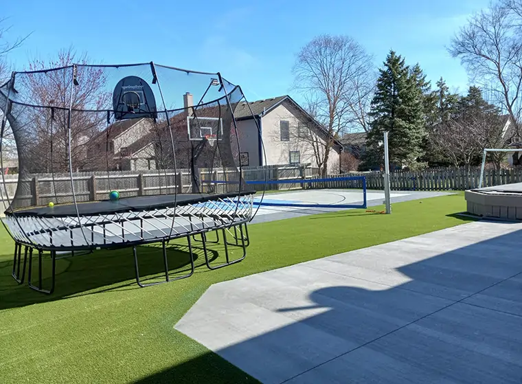 Artificial grass backyard play area in Alabama