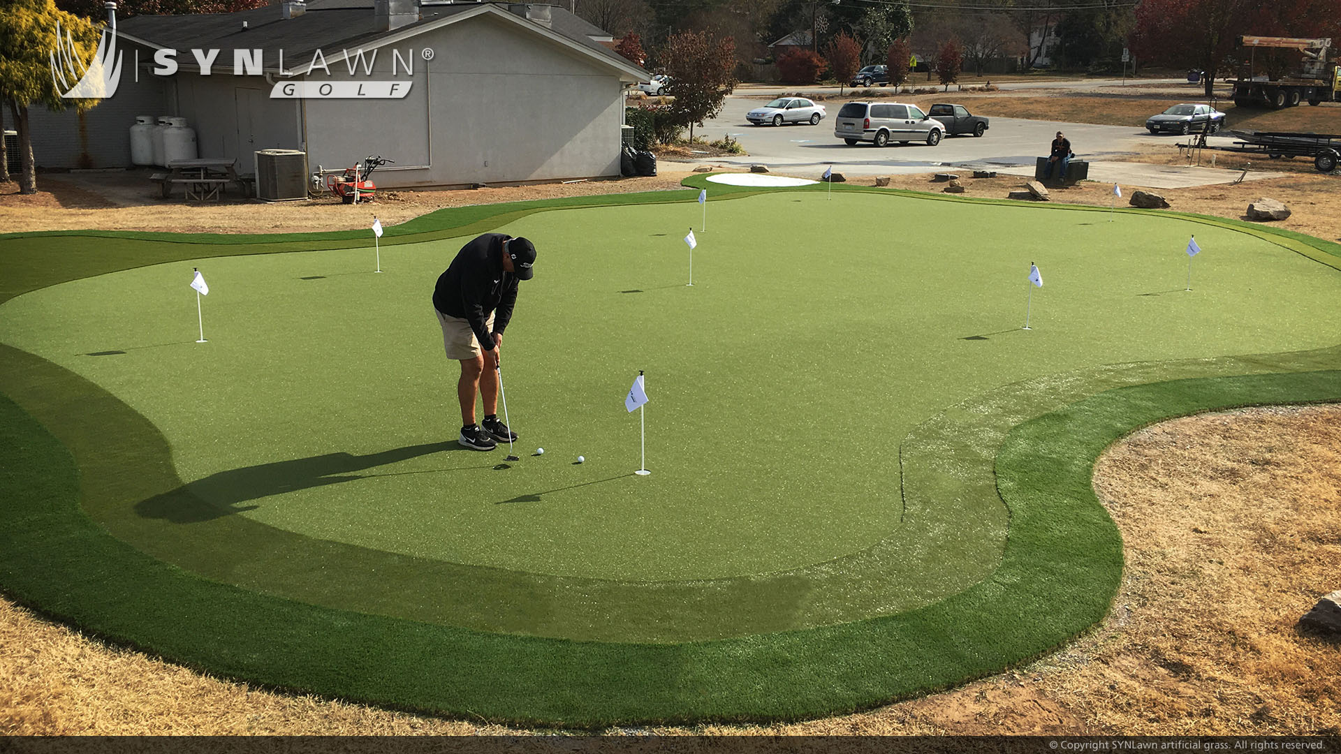 Backyard golf green installed by SYNLawn Alabama